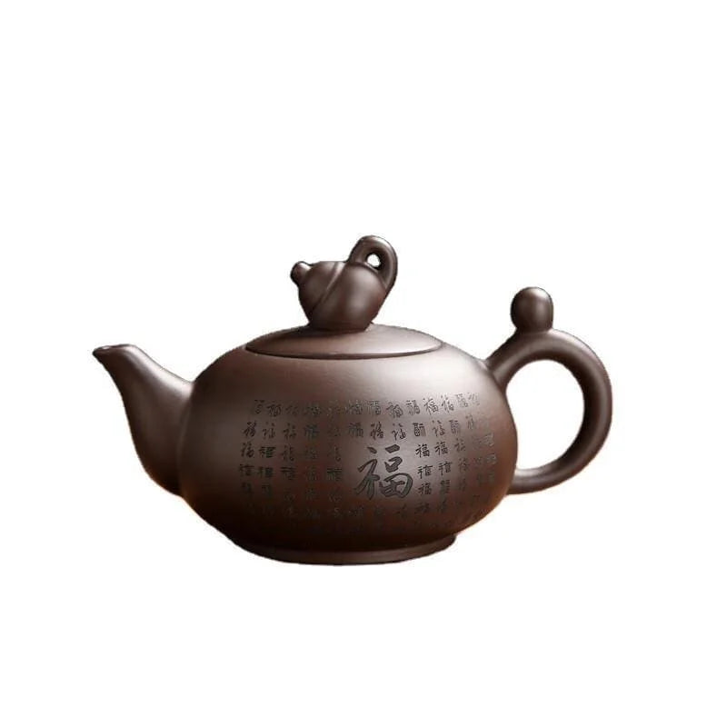 Chinesische teekanne yixing braun motiv symbole aus ton