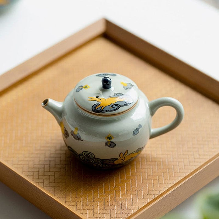 Japanische teekanne keramik - welle und orangefarbener hase